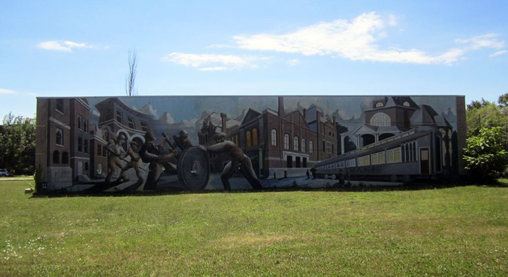 The mural tells the whole truth, clearly.